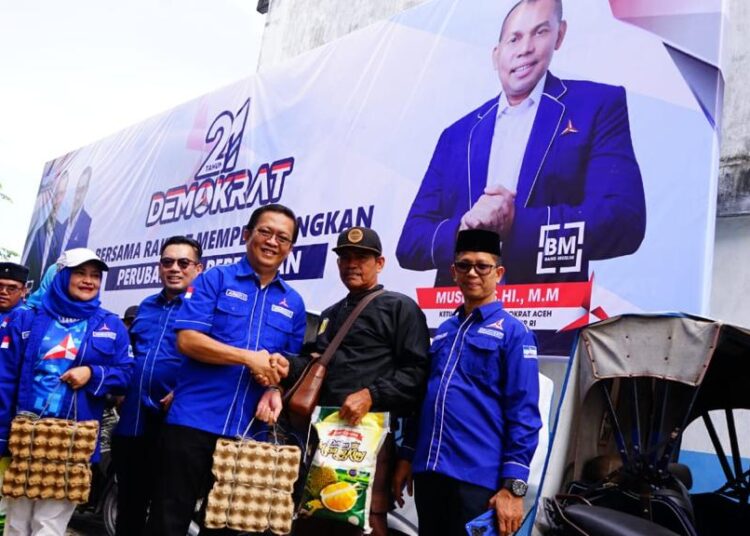 Peringati HUT Ke-21, Demokrat Aceh Bagikan Sembako dan Santuni Anak Yatim