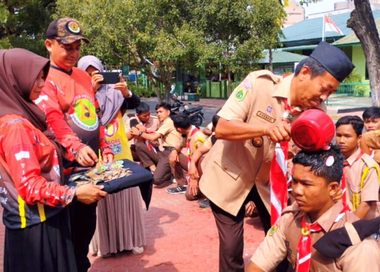 Kwarcab Lhokseumawe Lantik 28 Anggota Satgas Pramuka Peduli