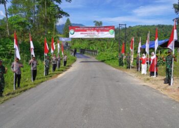 Kodim Aceh Utara Kibarkan 12 Ribu Bendera Merah Putih Sepanjang 17 Kilometer Jalan Gunung Salak