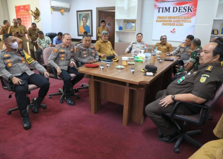Pj Bupati Aceh Utara Pantau Persiapan Final Desk Pemilu Bersama Pejabat Polda Aceh