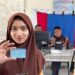 Disdukcapil Aceh Utara melakukan perekaman KTP elektronik (KTP-el) bagi pemilih pemula di SMAN 1 Seunuddon. Foto: IST.