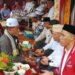 Peusijuek (tepung tawar) Gubernur Aceh Terpilih bersama Bupati dan Wakil Bupati Aceh Utara Terpilih di kompleks Makam Sultan Malikussaleh, Aceh Utara, Selasa (7/1/2025). Foto: For Infoacehutara.com