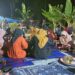 Mahasiswa KPM Kelompok 11 UIN Sultanah Nahrasiyah (SUNA) Lhokseumawe mempelajari tradisi Duek Pakat bersama warga Desa Geudumbak, Langkahan, Aceh Utara