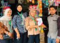 Mahasiswa KKN-PPM Kelompok 16 Universitas Malikussaleh (Unimal) mendata sekaligus mengedukasi pelaku UMKM terkait penggunaan pembayaran digital QRIS di Gampong Blang Dalam Tunong, Kecamatan Nisam