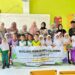 Aksi edukatif mahasiswa KKN Kelompok 59 Unimal saat mendampingi siswa SD Negeri 2 Kuta Makmur belajar membaca lewat media susun huruf,