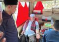 Ketua PMI Aceh Utara, Tantawi, saat mendampingi Bupati Aceh Utara, Ismail A. Jalil (Ayahwa), berpartisipasi dalam aksi donor darah peringatan Hari Santri Nasional 2026 di Lhoksukon